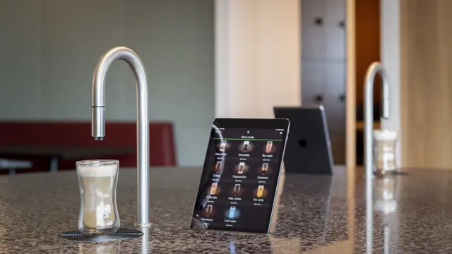 Image showing 2 TopBrewer commercial coffee machines, one in the foreground facing the camera and one in the background facing away