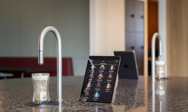 Image showing 2 TopBrewer commercial coffee machines, one in the foreground facing the camera and one in the background facing away