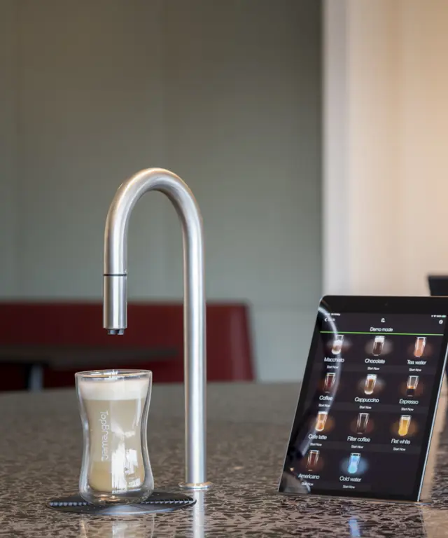 Image showing 2 TopBrewer commercial coffee machines, one in the foreground facing the camera and one in the background facing away