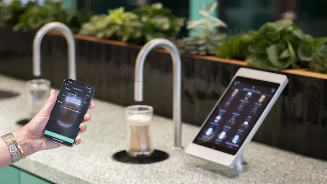 Image showing TopBrewer app on customisation screen with TopBrewer and TopWater in the background