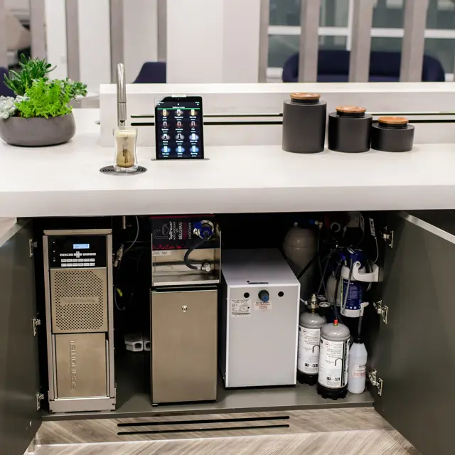 AmTrust TopBrewer showing under cabinet