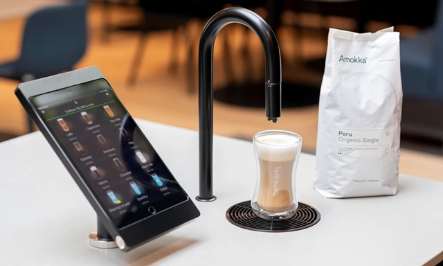 Image showing matte black TopBrewer with deluxe iPad holder and bag of Amokka coffee next to it